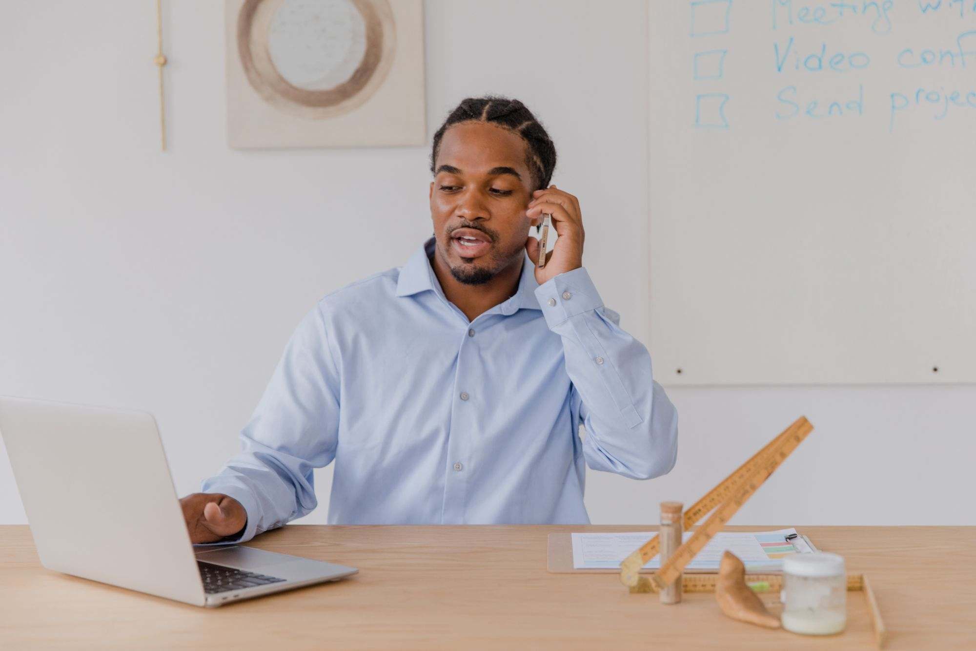 A professional on a phone call at a desk